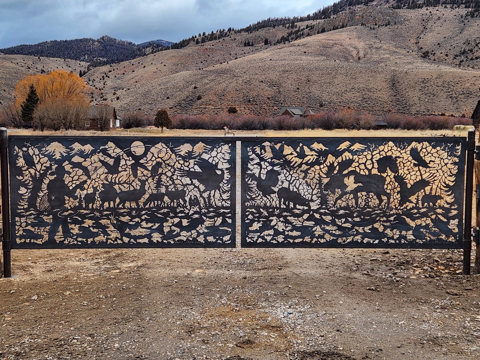 Close-up of custom wildlife metal gate