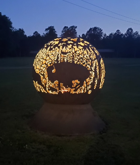 Illuminated buffalo fire globe at night