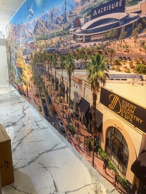 Custom mural viewed through the completed hallway