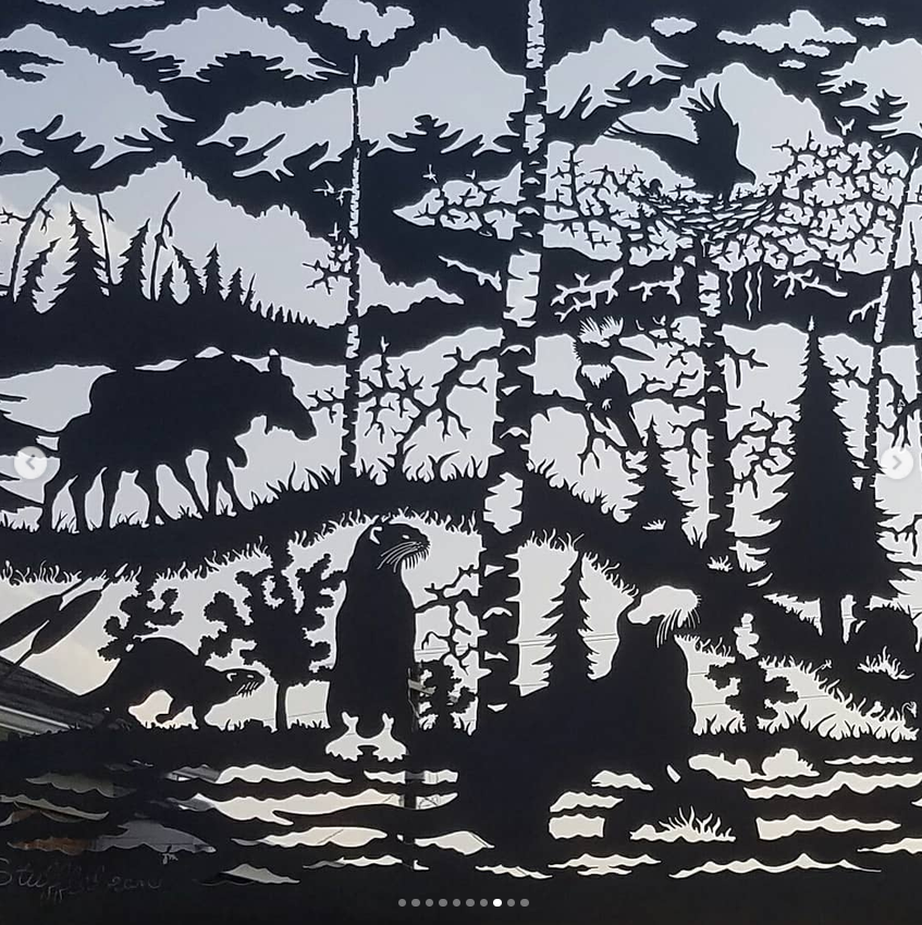 Close-up wildlife details in metal mural