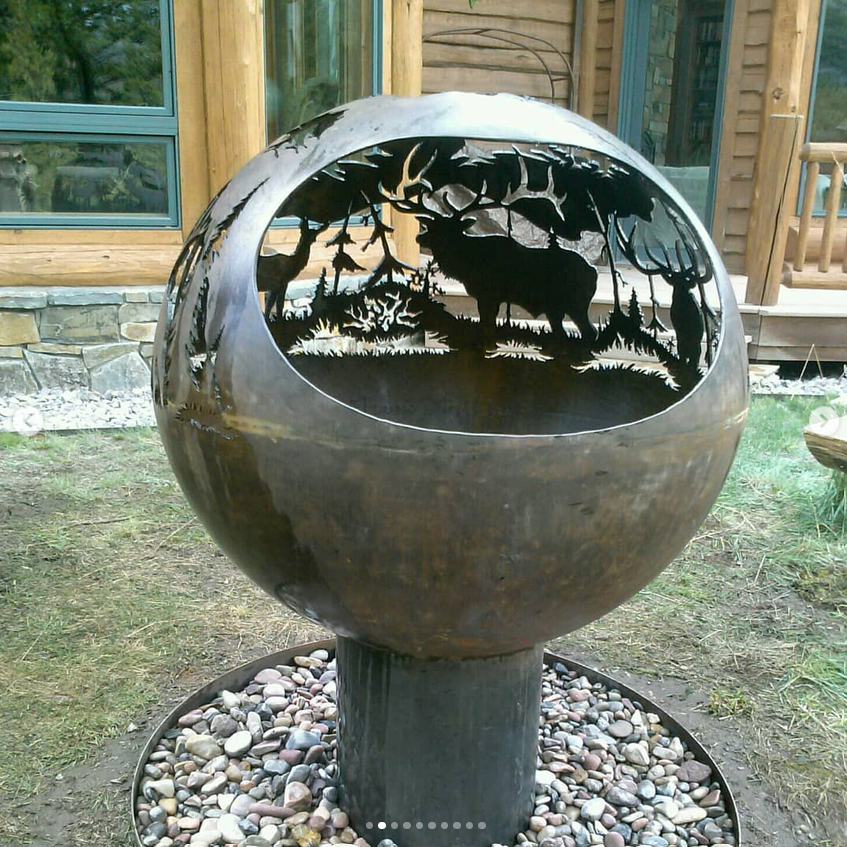 Custom wildlife fire globe sculpture