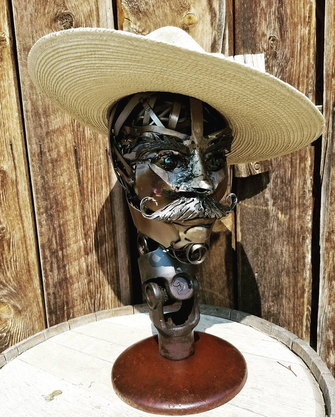 Custom sculptural metal cowboy bust