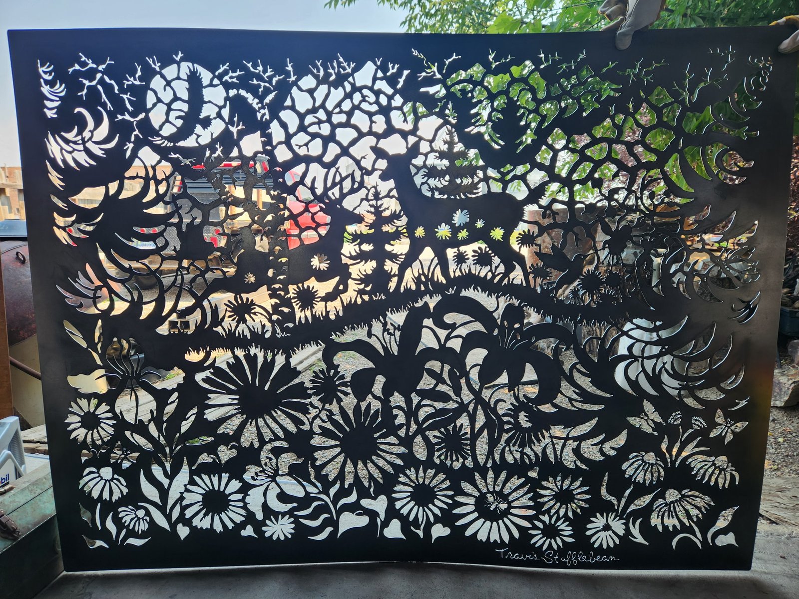 Recent custom metal artwork by Travis Stufflebean